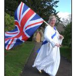 Maureen proudly waving the Union Flag in the LADS production.